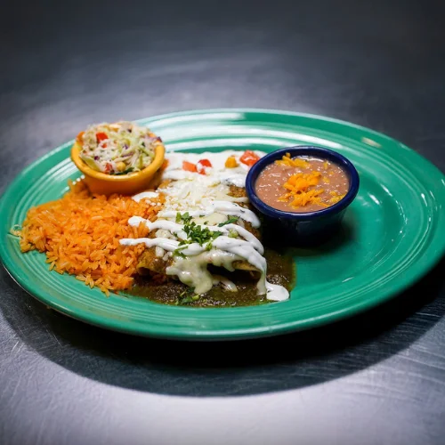Enchiladas Suizas - Enchiladas in creamy green tomatillo sauce